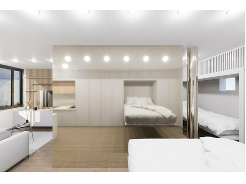 Maisonette-Schlafbereich mit raumhoher Schrankwand und integrierter Beleuchtungsanlage
