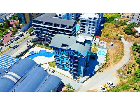 Brandneue Luxus Residence in Top Lage in direkter Strandnähe mit Pool