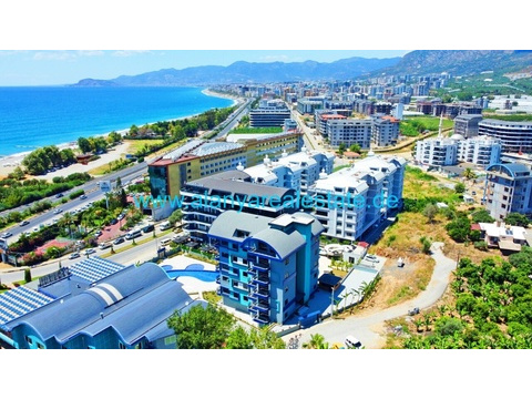 Brandneue Luxus Residence in Top Lage in direkter Strandnähe mit Pool