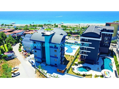 Brandneue Luxus Residence in Top Lage in direkter Strandnähe mit Pool