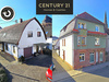Mehrfamilienhaus kaufen in Friedrichsthal, mit Garage