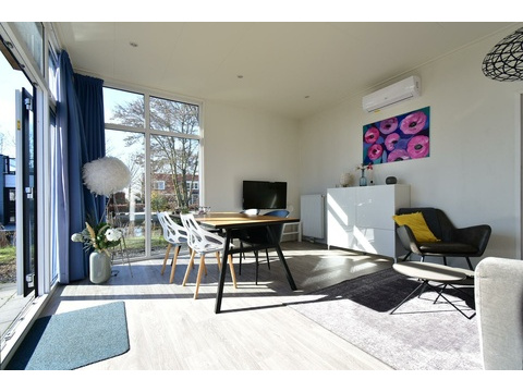 Wohnzimmer mit Essbereich – Ferienhaus zu verkaufen Hulshorst (Bad Hoophuizen)