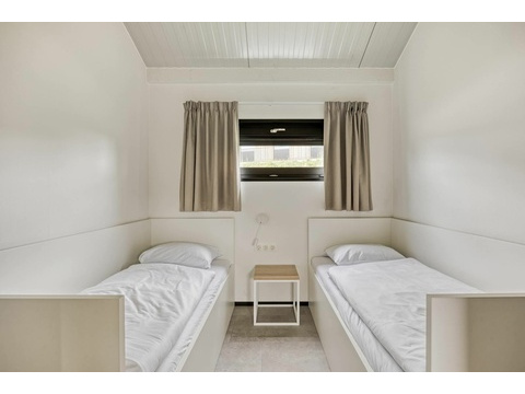 schlafzimmer-einzelbetten-ferienhaus.jpg003