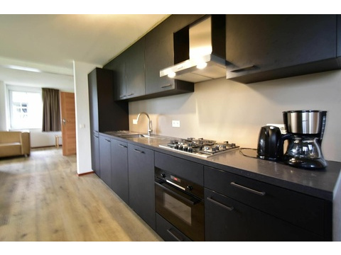 ferienhaus-kaufen-ferienresort-cochem-cochem-niederlande-moderne-kuche-mit-sitzecke-2025