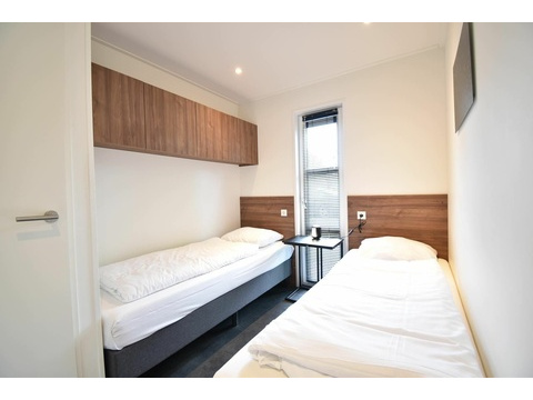 ferienhaus-kaufen-biddinghuizen-hauptschlafzimmer-2025.webp09