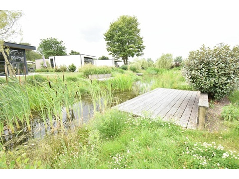 ferienhaus-kaufen-biddinghuizen-terrassen-durchsicht-gaskamin-2025.webp09