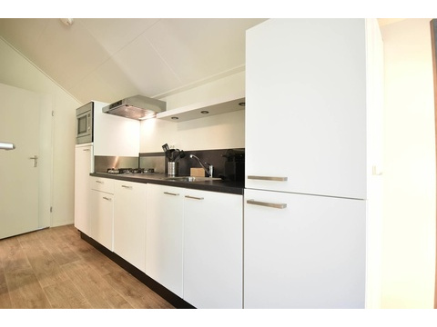 chalet-kaufen-arnhem-offene-kuche-wohnzimmer-modern-2025.webp001