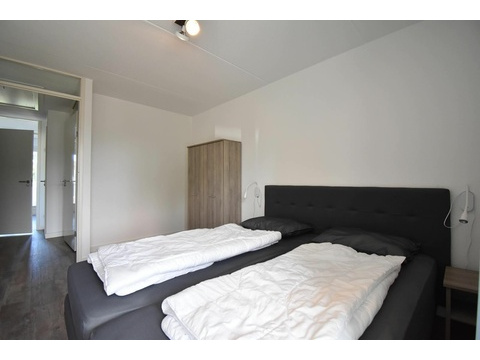 ferienwohnung-schlafzimmer-cape-helius-balcony-zugang-boxspring007