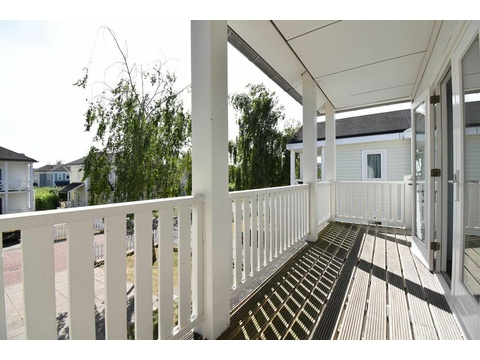 ferienwohnung-schlafzimmer-cape-helius-balcony-zugang-boxspring01