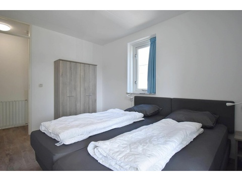 ferienwohnung-schlafzimmer-cap-helius-balcony-zugang-boxspring05