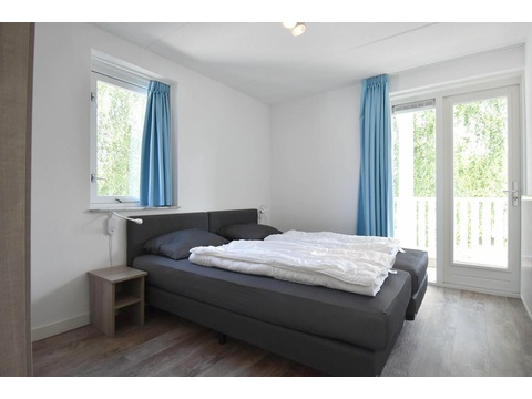 ferienwohnung-schlafzimmer-cap-helius-balcony-zugang-boxspring04