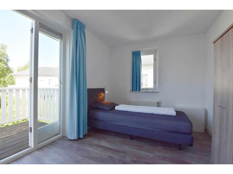 ferienwohnung-schlafzimmer-cap-helius-balcony-zugang-boxspring03