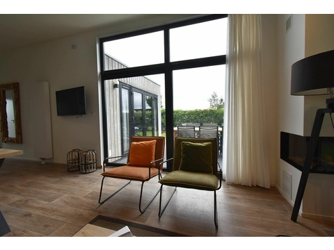 ferienhaus-kaufen-herkingen-wohnzimmer-esszimmer-2025.webp005