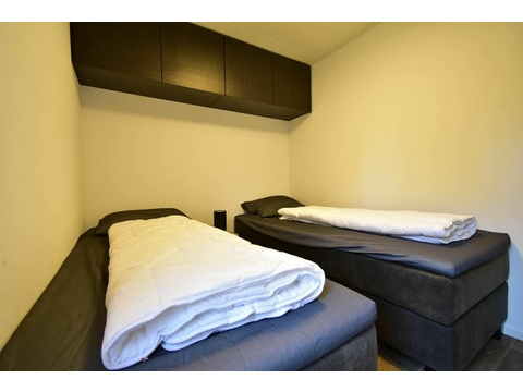 ferienhaus-kaufen-herkingen-schlafzimmer-boxspring-2025.webp008