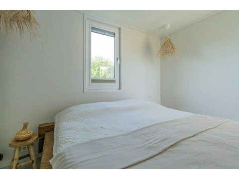 Hauptschlafzimmer Ibiza-Stil Chalet Schouwen Duin Holz Schiebetür003