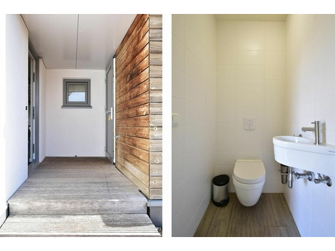 Ferienhaus Ouddorp Badezimmer Doppelwaschbecken Holz Roompot06