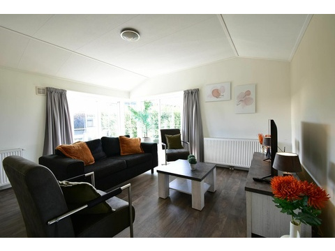 Ferienhaus EuroParcs De Rijp Wohnzimmer Offene Aufteilung004