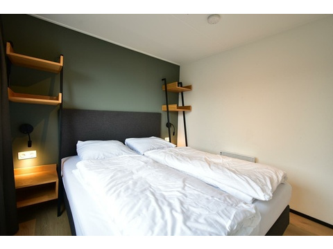 ferienhaus-kaufen-lakeside-resort-brielle-zwartewaal-schlafzimmer-3-doppelbett-2026