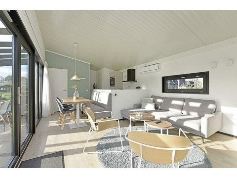 kaufen-meadow-brielle-wohnzimmer-interieur-licht-recreatieadviseurs-vakantiehuistekoop-nl.jpg