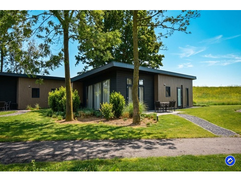 kaufen-freistehendes-ferienhaus-lith-aussenansicht-sonniger-garten-recreatieadviseurs...