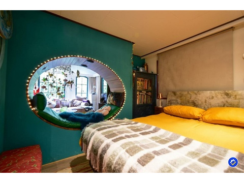 kaufen-freistehendes-ferienhaus-doornspijk-schlafzimmer-runder-durchblick-recreatieadviseurs...