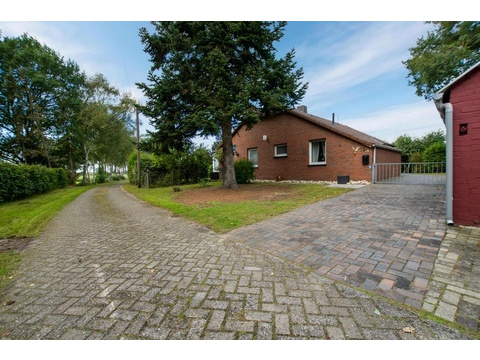 Einfamilienhaus kaufen in Bunde, 1.675 m² Grundstück, 122 m² Wohnfläche, 3 Zimmer