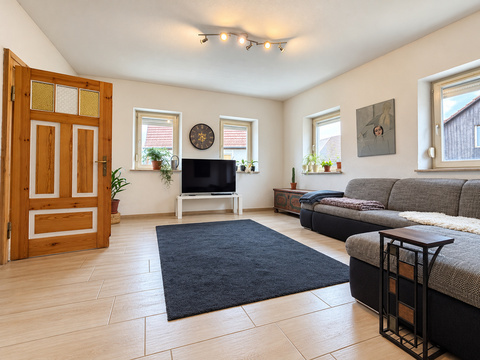Wohnzimmer_mit_Fensterfront