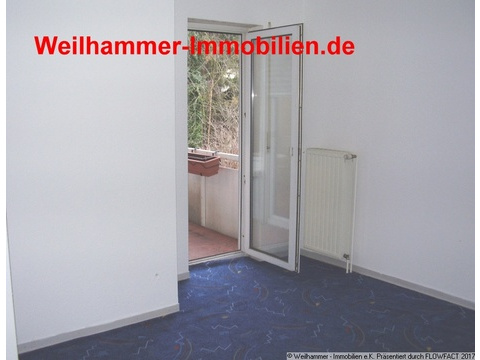 Wohnbereich mi Ausgang zum Balkon