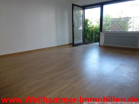 wohnen mit Ausgang zur Terrasse