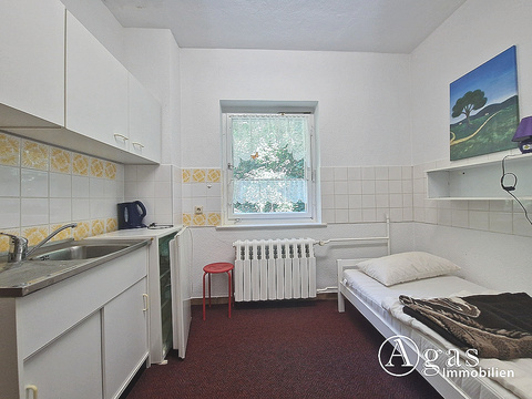 Zimmer mit Küchenzeile