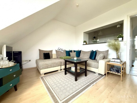 Dachgeschosswohnung kaufen in München, mit Stellplatz, 49 m² Wohnfläche, 2 Zimmer