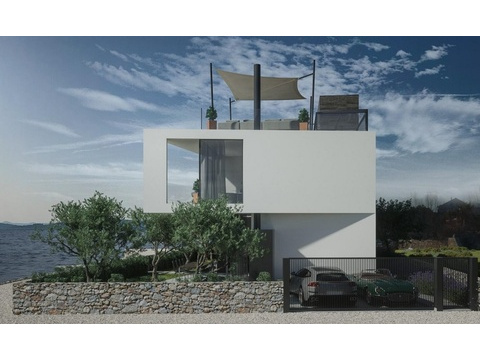 Moderne Luxusvilla in erster Reihe zum Meer