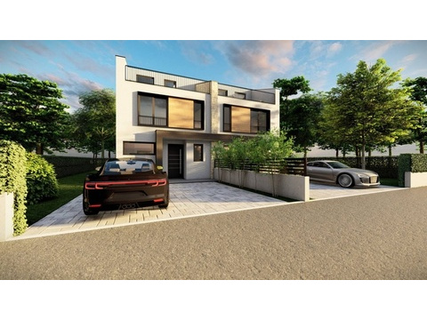 Moderne Doppelhaushälfte mit Fahrzeugen davor, angeboten von Panorama Scouting Immobilienmakler