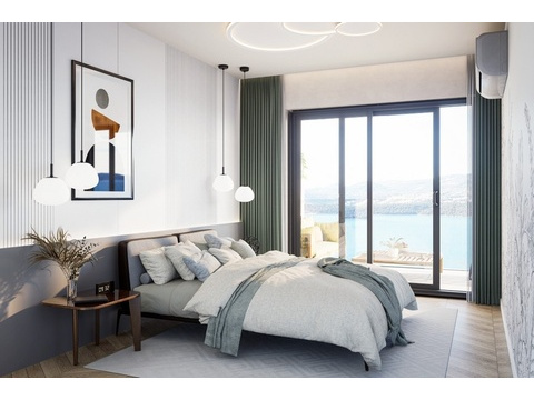 Schlafzimmer mit Zugang zum Balkon