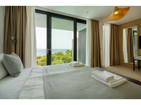Schlafzimmer mit Blick auf das Meer