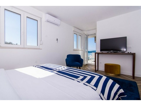 Schlafzimmer mit Balkontür