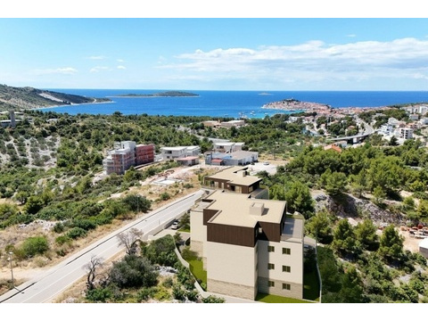 Visualisierung: fertiger Neubau mit Meer und Altstadt