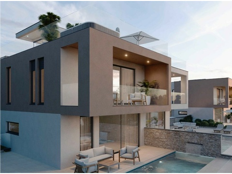 Haus mit überdachter Terrasse und Glasgeländer