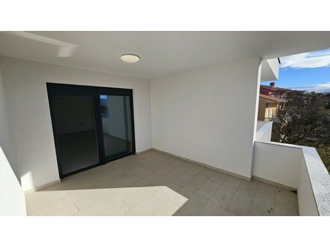 Loggia mit Schiebetür zum Wohnraum