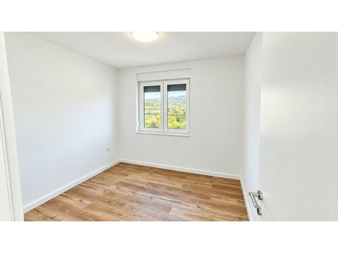 Schlafzimmer mit Holzboden